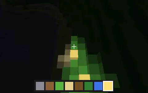 A voxel world at night, lit by lamps